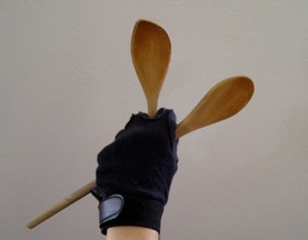 Practice four in hand with wooden spoons